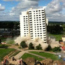 A controlled demolition at a construction site.