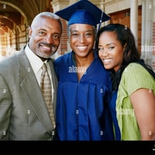 A parent celebrating at a graduation ceremony