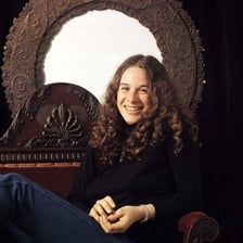 Carole King performing or posing for a portrait.