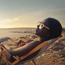 A traveler relaxing on a beach