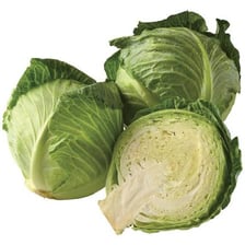 A whole green cabbage forming a compact head