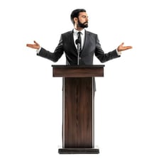 A speaker giving a formal speech at a podium.