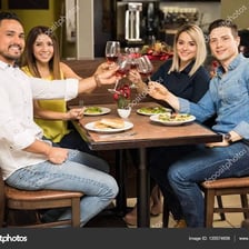 Two couples dining together on a double date