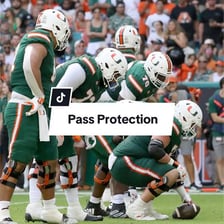 Football offensive linemen protecting a quarterback