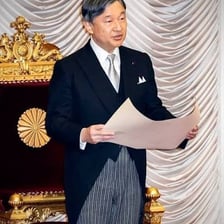 An official portrait or ceremony featuring the Japanese emperor
