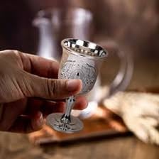 An ornate ceremonial chalice with a stem and bowl