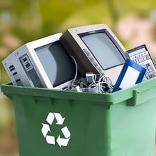 Discarded electronic devices prepared for recycling.