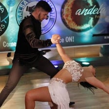 A performer displaying energetic movement and style.