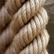 Rope sections secured with several ties and knots.