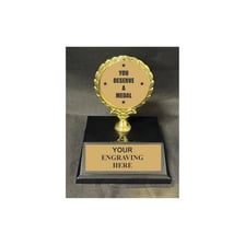 A person receiving an award for an achievement.