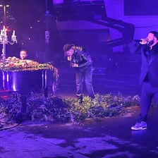 A rap artist performing at a Grammy Awards ceremony
