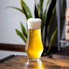 A golden pilsner beer served in a glass.