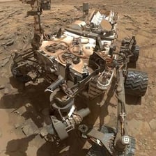 A NASA Mars rover positioned on the Martian surface