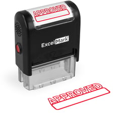 A document marked approved with a rubber stamp