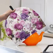 A decorative tea cosy covering a teapot