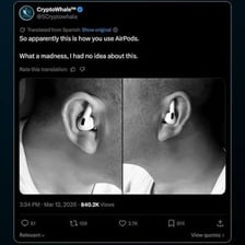 Wireless earbuds being worn in a person's ears