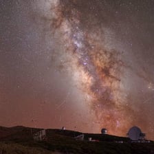 Bright Perseid meteors streaking across a summer night sky