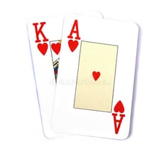 An ace and a king from a standard deck of playing cards.