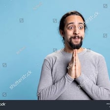 An enthusiastic person cheering with raised arms.