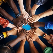 People joining hands to symbolize unity