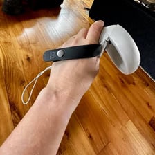 A strap wrapped around and securing an object