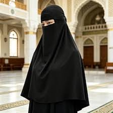 A woman wearing a niqab that covers her face below the eyes