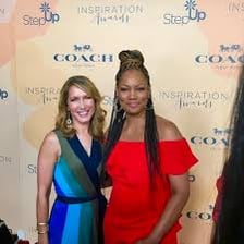 A publicist coordinating media coverage at an interview.