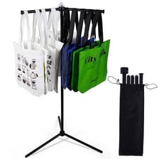 Retail merchandise displayed in a store with shopping bags nearby