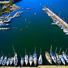 Boats moored beside a pier