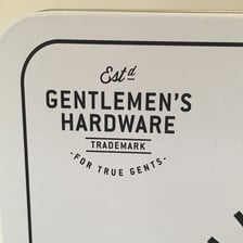 A company sign displaying an established-date abbreviation