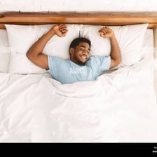 A person sleeping during a daytime nap