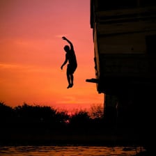 A person captured mid-leap.