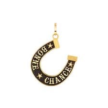 A vintage-style lucky charm associated with chance.