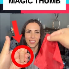 A magician performing a disappearance trick