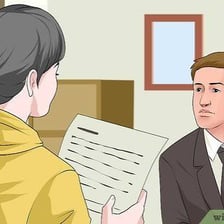A person speaking confidentially with an authority figure.