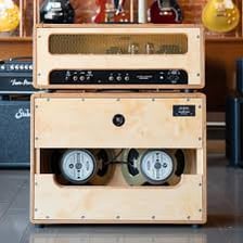 A guitar amplifier in a rectangular cabinet.
