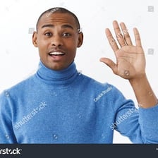 Two people greeting after one notices the other unexpectedly.