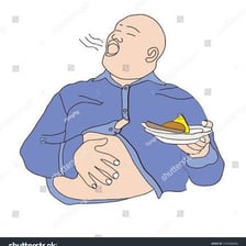 A person appearing satisfied after eating.