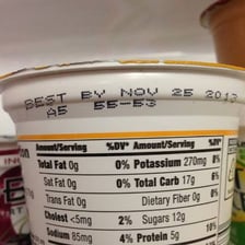 A food package displaying a use-by date.