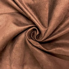 Close-up of the fuzzy surface of brown suede.