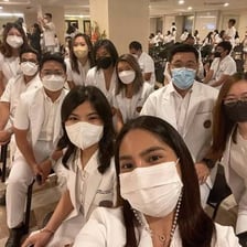 A medical intern working in a hospital.
