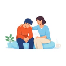 One person gently helping another person.