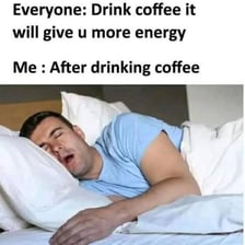 A person holding coffee and appearing highly energized