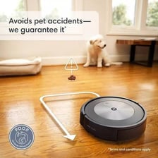 An iRobot Roomba robotic vacuum cleaner operating on a floor