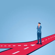 A person making a sharp turn at a crossroads