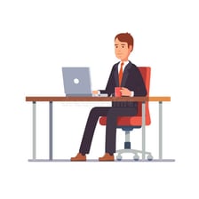 A person working at a desk in an office job.