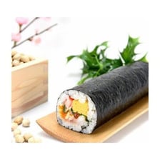 A sheet of nori wrapped around a maki sushi roll