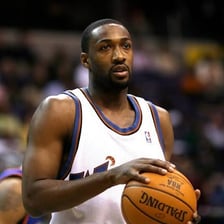 A prominent basketball player competing on an NBA court