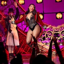 Megan Thee Stallion performing onstage.