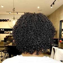 Close-up of tightly coiled 4C natural hair